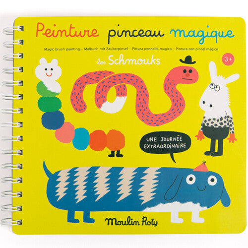 Moulin Roty magisch kleurboek met gele kaft en vrolijke monsterfiguren.