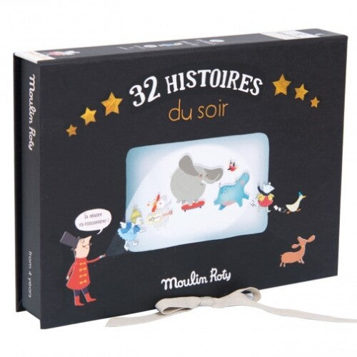 Moulin Roty projector bioscoop verpakking met sterren en een illustratie van dieren.