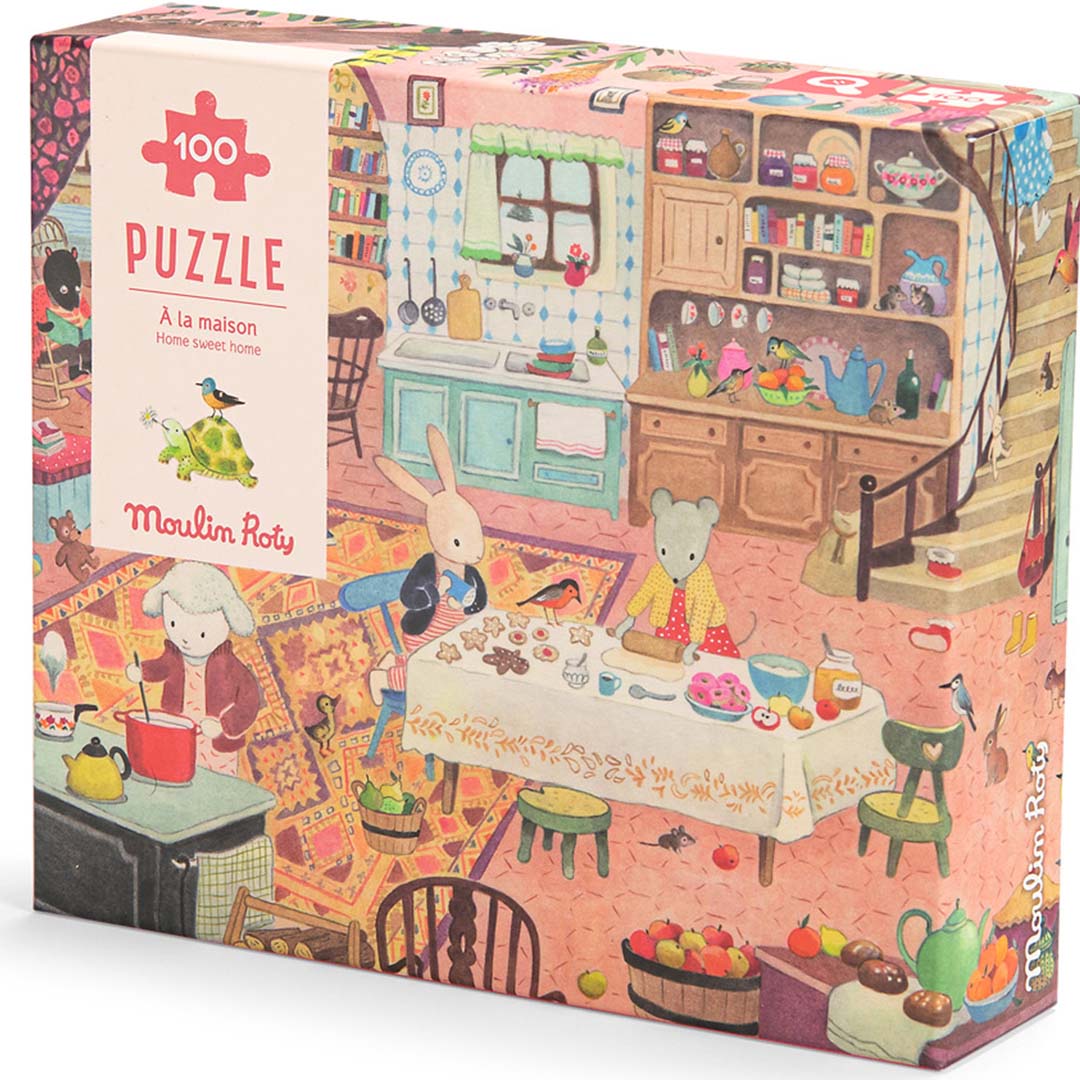 Moulin Roty puzzelverpakking met een illustratie van dieren die bakken in een keuken.