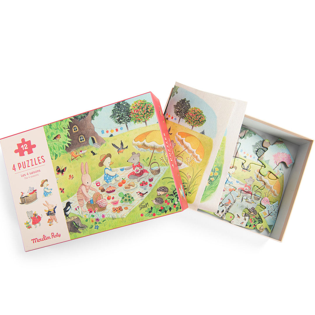 Open Moulin Roty legpuzzel set 'La Grande Famille' met een deels gelegde dierenpuzzel.