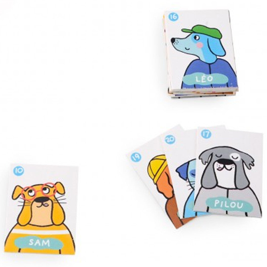 Drie stapels losse speelkaarten van het raadspel met geïllustreerde hondenfiguren.