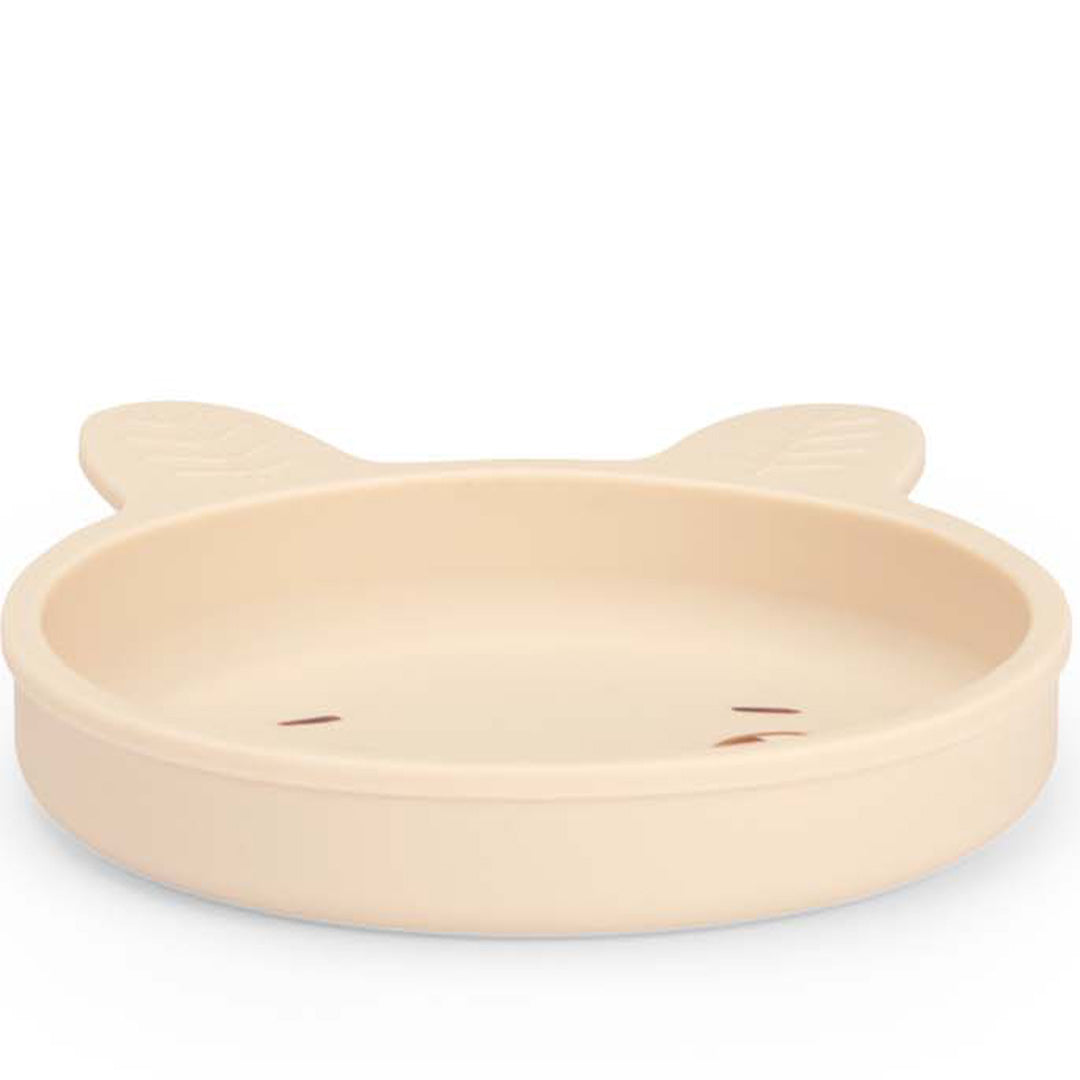 Het beige siliconen bord in de vorm van een kattengezicht, van voren gezien.