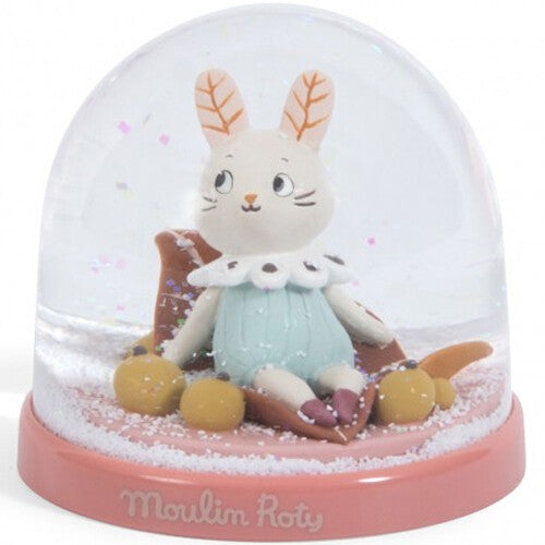 Moulin Roty sneeuwbol met een konijnfiguur in een roze basis, met glitter in het water.