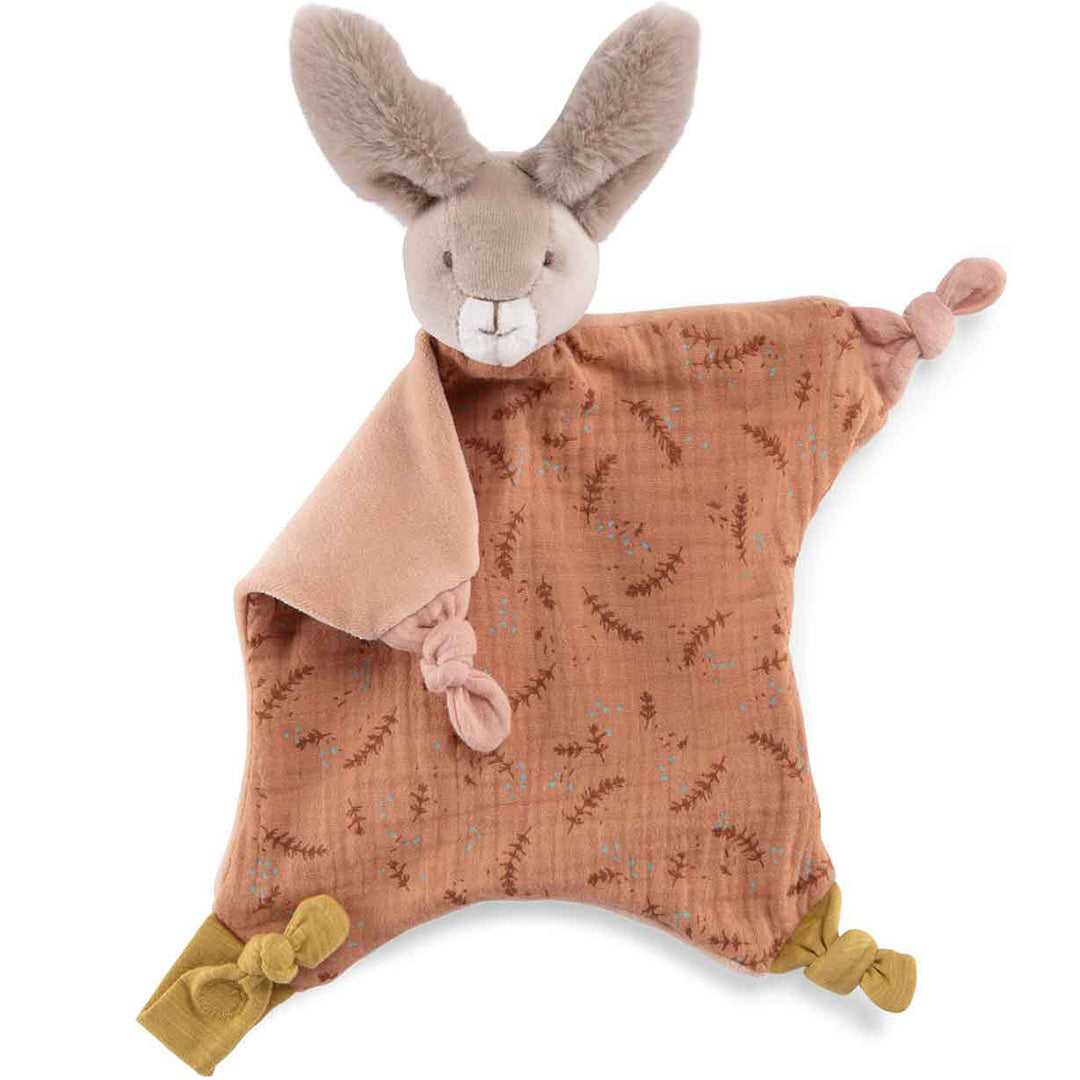 Moulin Roty babyspeelgoed speendoek konijn met een oranje doek met bladerenpatroon, waarvan een hoek is omgevouwen.