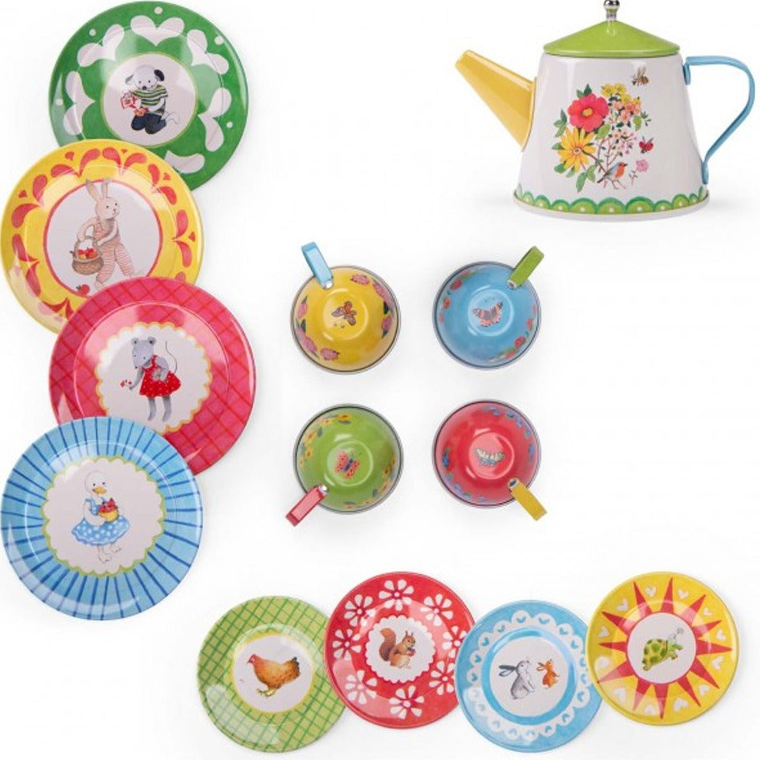 Detail van het Moulin Roty speelgoed theeservies met diverse bordjes, kopjes en de theepot met dieren- en bloemenpatronen.