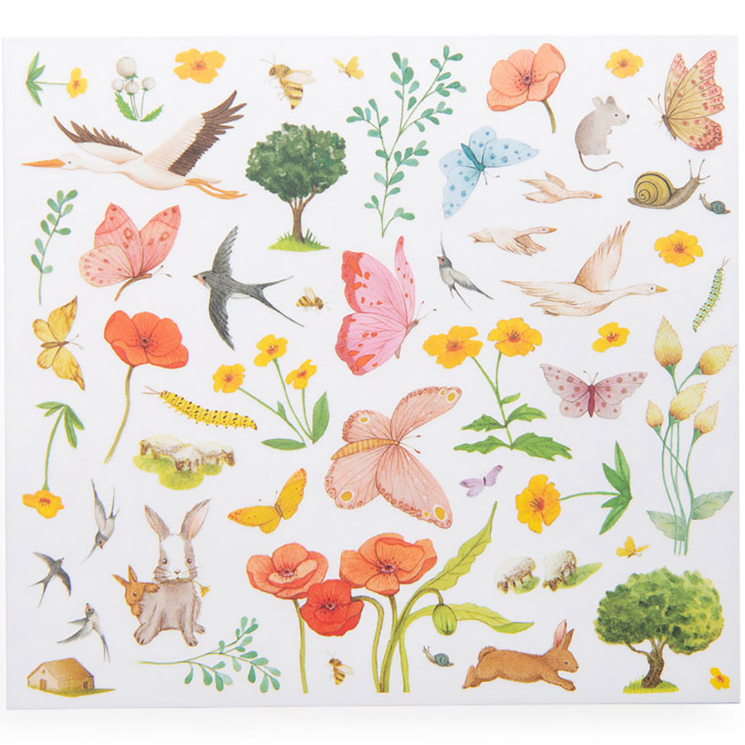 Detail van een vel Moulin Roty transferstickers met vlinders, vogels, bloemen en konijnen.