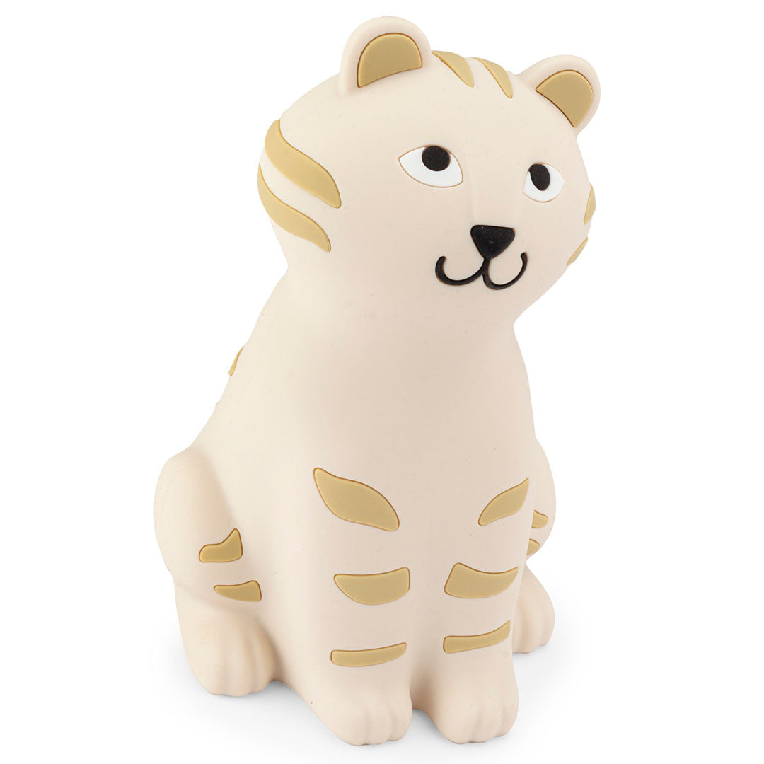 Moulin Roty nachtlampje in de vorm van een beige tijger, schuin van voren gezien.