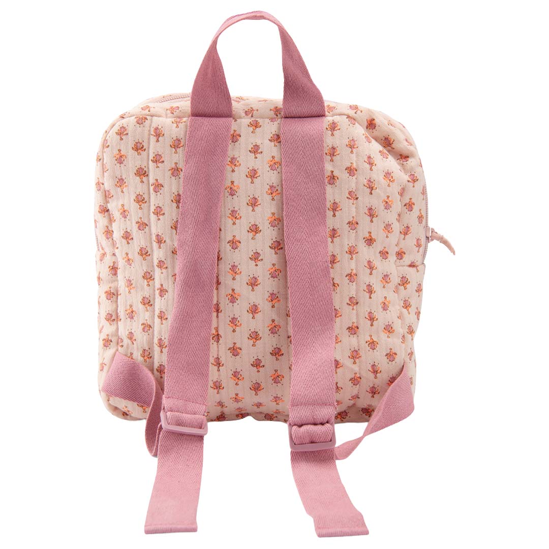 Moulin Roty roze gebloemde poppendraagzak van polyester, met de verstelbare schouderbanden aan de achterkant.