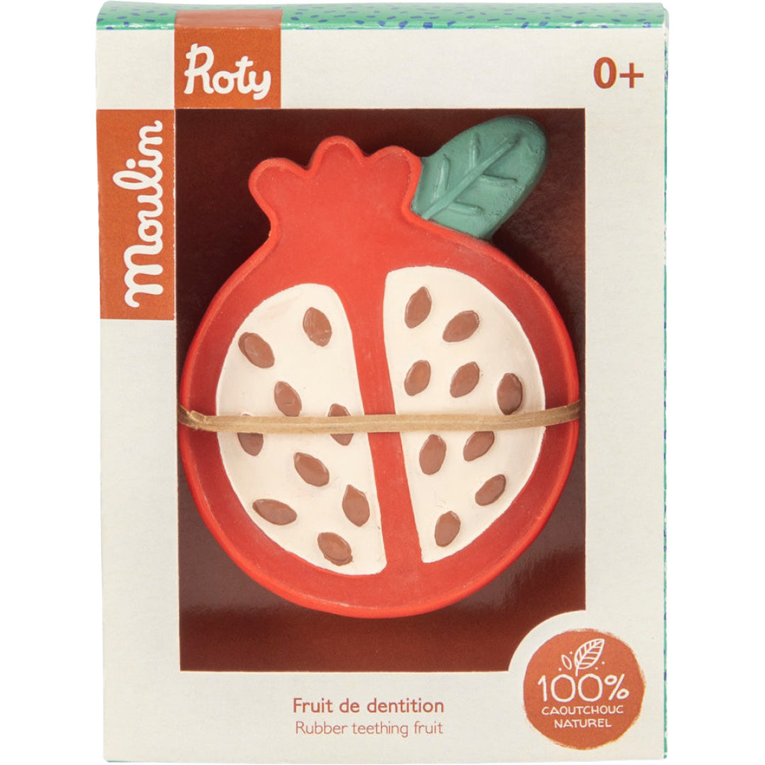 De Moulin Roty granaatappel bijtring in de productverpakking met tekst 'Fruit de dentition'.