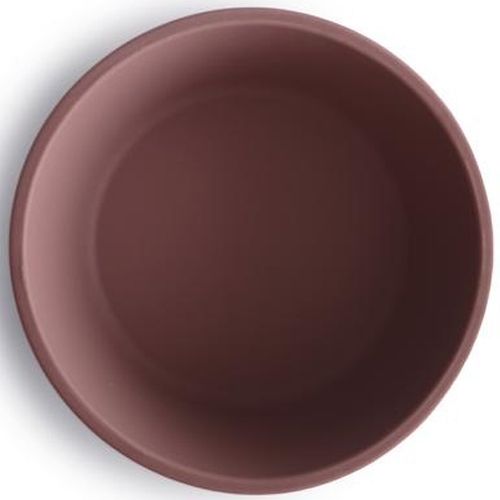 Een bovenaanzicht van een mushie siliconen kinderkom in de kleur cloudy mauve.