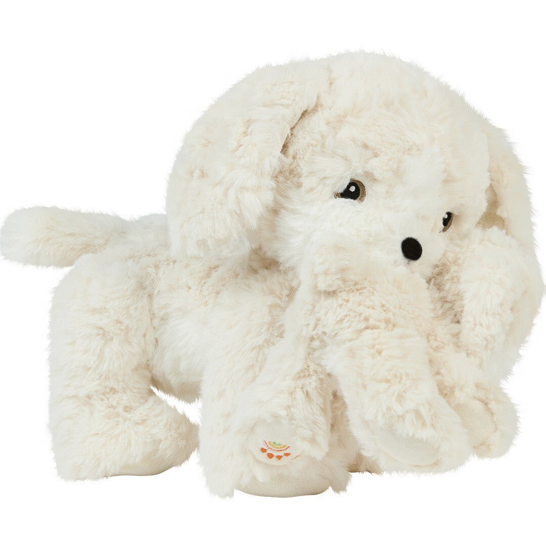 Olli Ella pluchen knuffelhond Dinkum Puppy Belle in crème, staand op vier poten met open ogen.