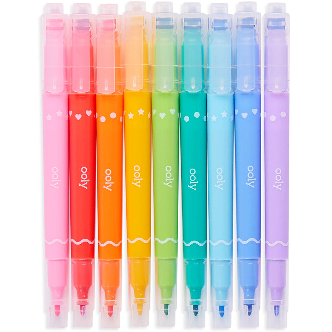 Negen ooly dubbelzijdige viltstiften en stempelmarkers in regenboogkleuren, rechtopstaand.