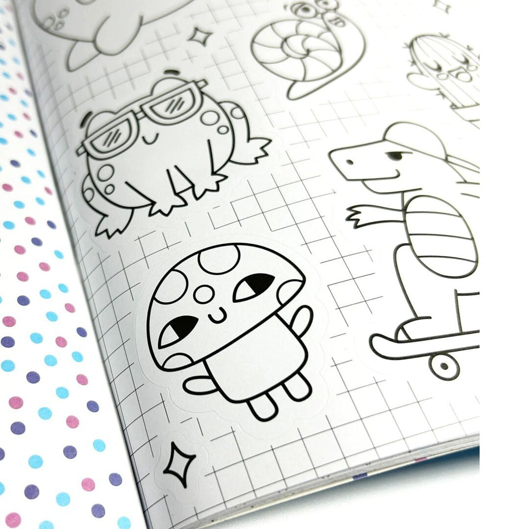 Een open pagina van het ooly stickerboek met oningekleurde stickers van een kikker, paddenstoel en skateboardende dinosaurus.