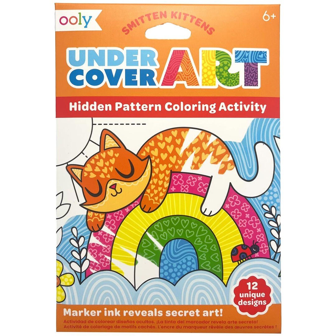 De voorkant van de ooly Undercover Art Smitten Kittens kleurplaten verpakking met een oranje kat op een regenboog.