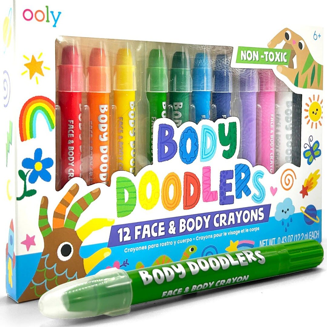 Ooly Body Doodlers verpakking met 12 gezichts- en lichaamskrijtjes in verschillende kleuren, met een groen krijtje ervoor.
