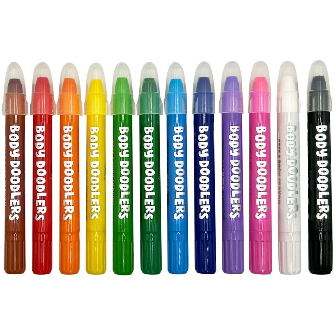Twaalf Ooly Body Doodlers lichaamskrijtjes in verschillende kleuren, op een rij.