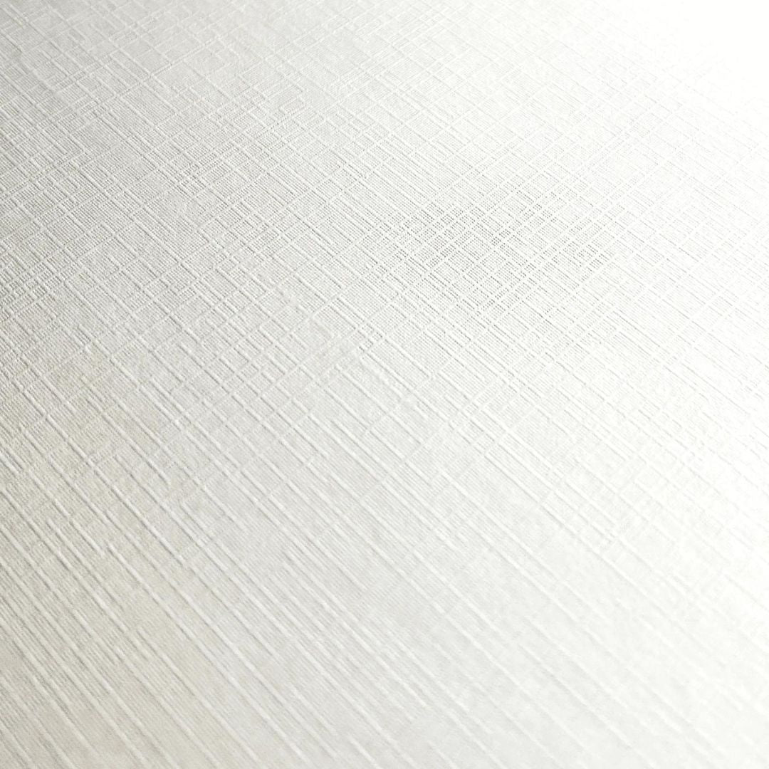 Close-up van de medium korrel textuur van het witte canvaspapier.