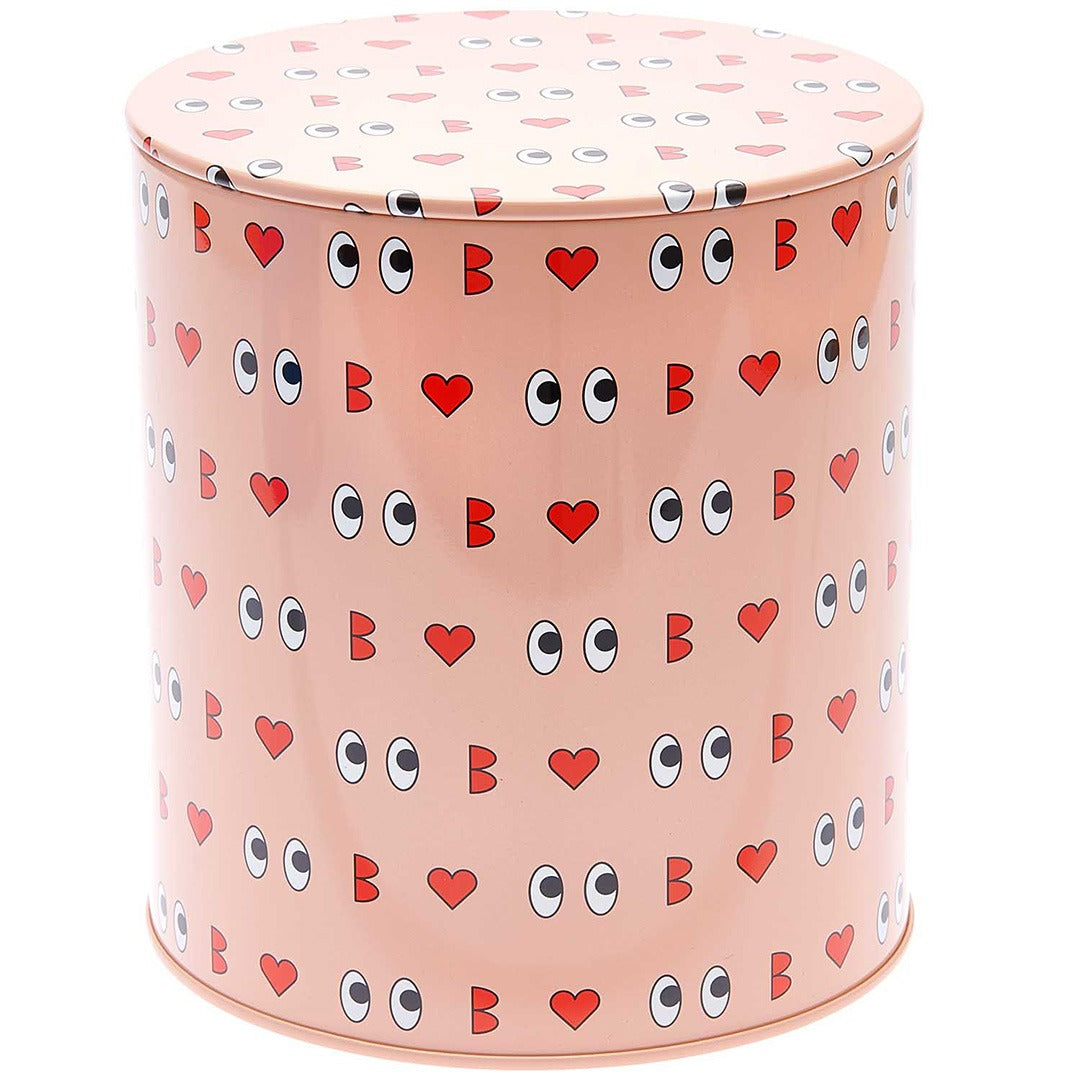 Rico Design roze metalen koekjestrommel met een patroon van ogen en harten.