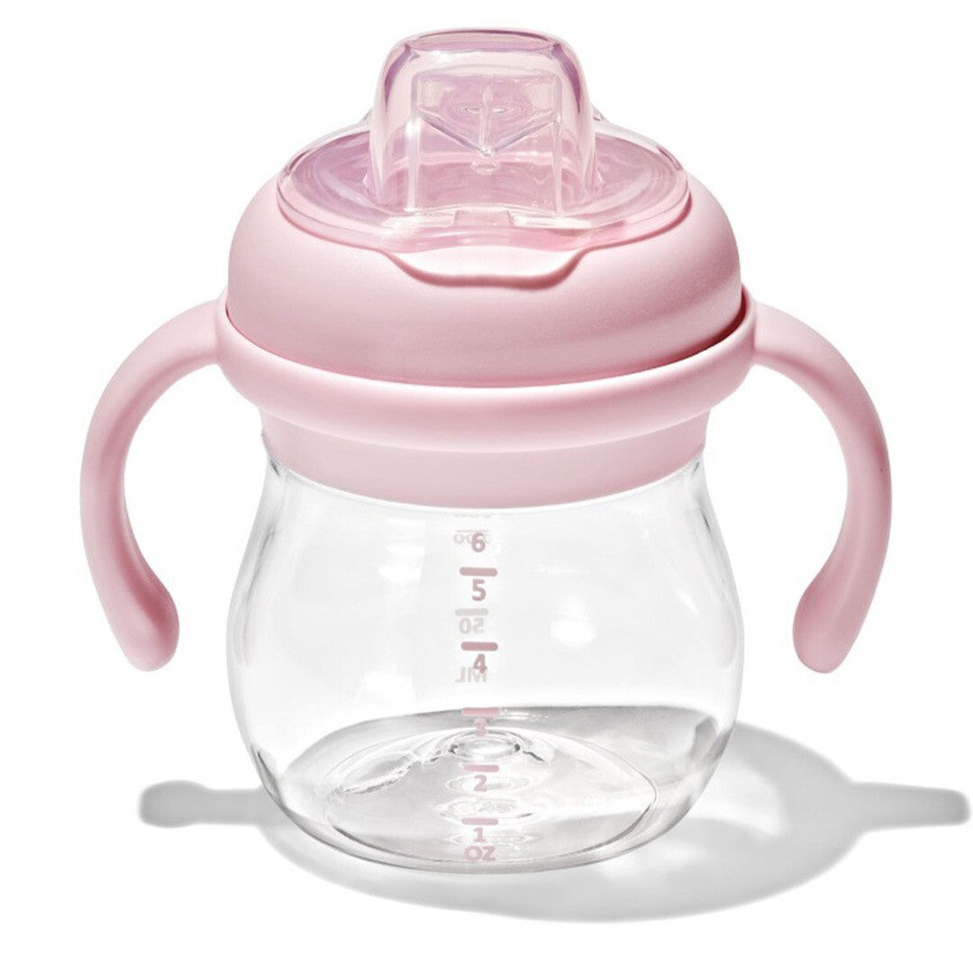Oxo tot tuitbeker voor baby's in roze en transparant met handvatten.