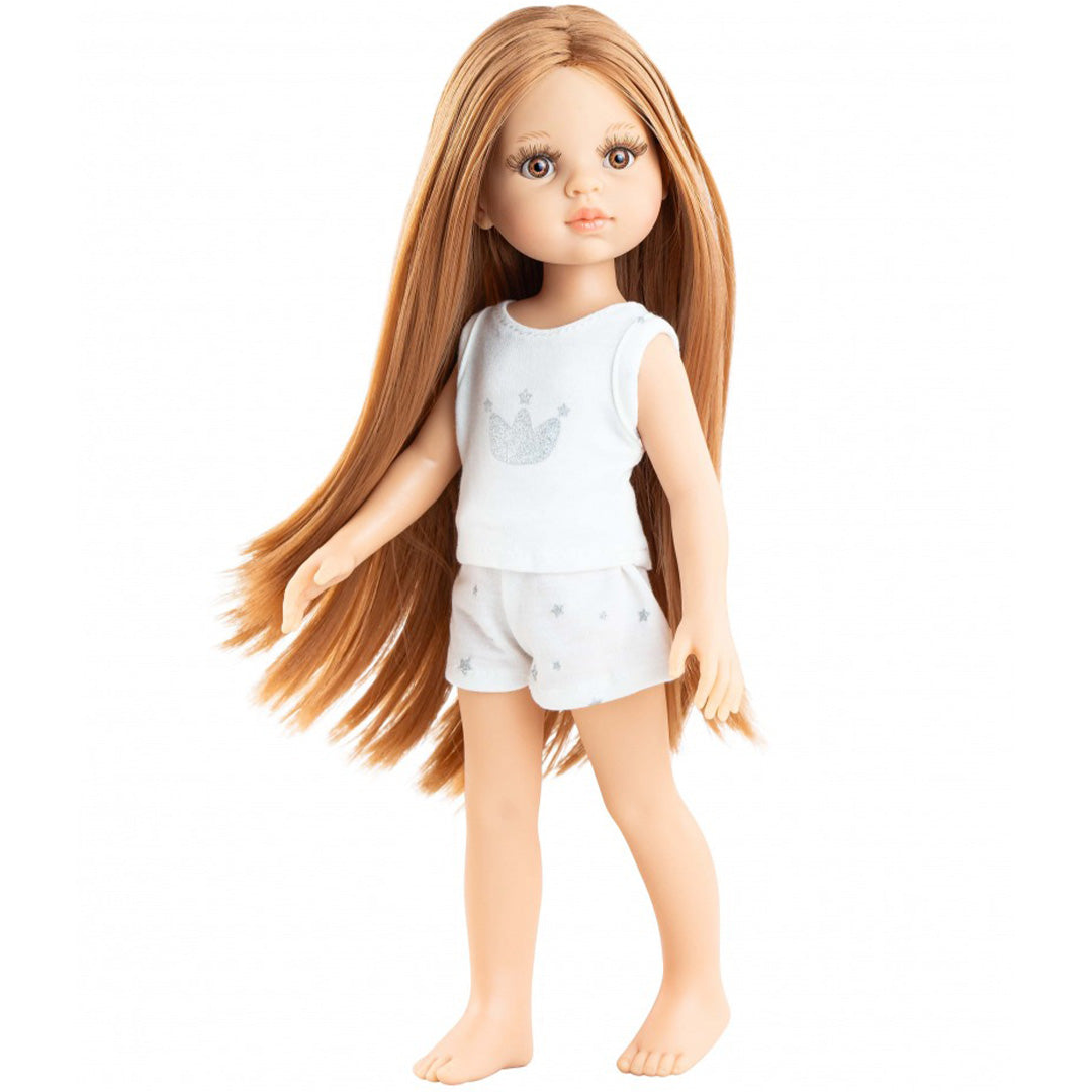 Paola Reina pop Amigas Christi met lang rood haar en witte pyjama met sterren en kroon.