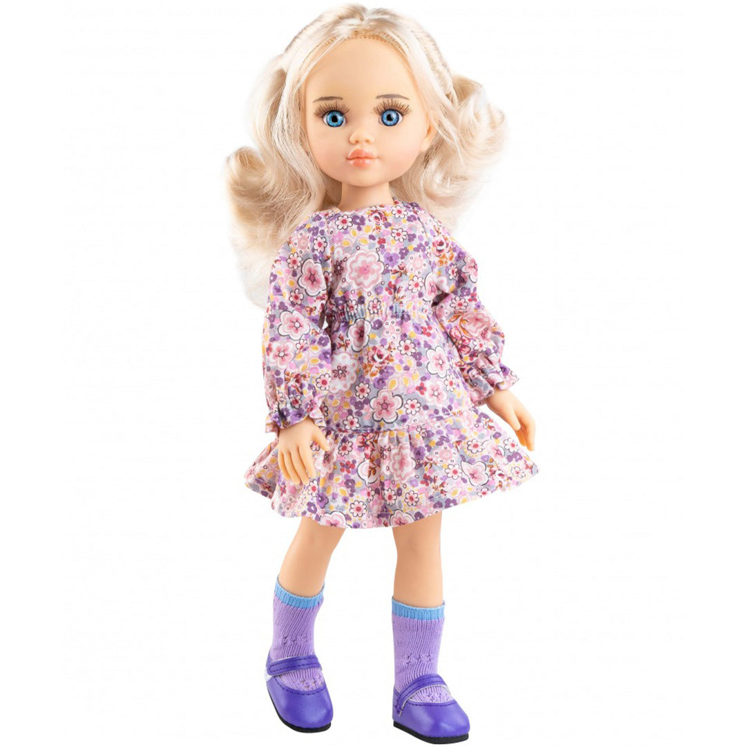 Paola Reina pop Clara met blonde krullen, blauwe ogen en een gebloemde jurk.