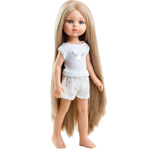 Paola Reina stapop Amigas Carla met lang blond haar, gekleed in een witte pyjama met sterren en een eenhoorn.