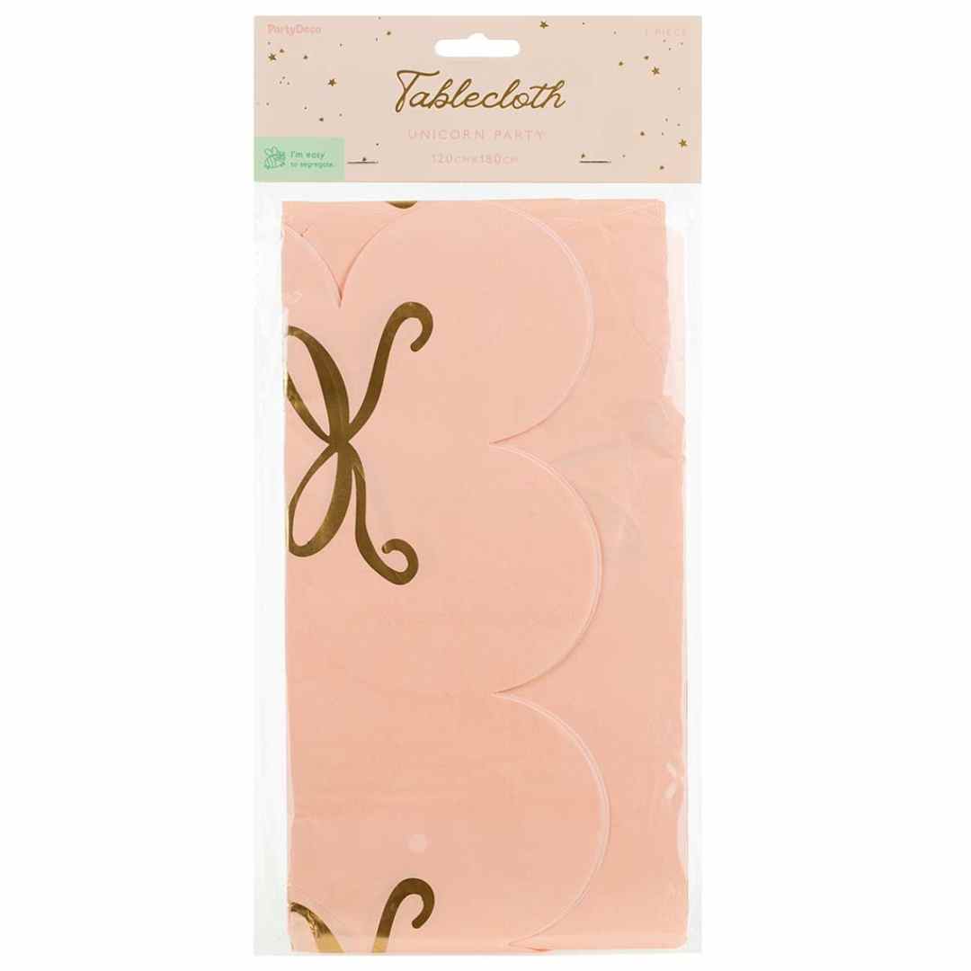 Verpakking van het PartyDeco papieren tafelkleed voor een eenhoornfeestje, met lichtroze kleur en gouden strikjes.