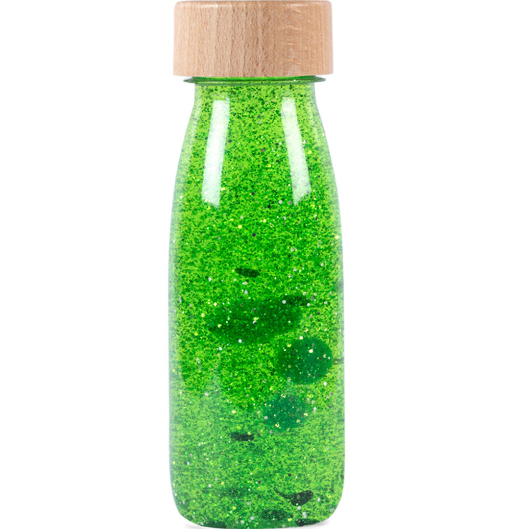 Petit Boum groene sensorische fles met glitter en houten dop.