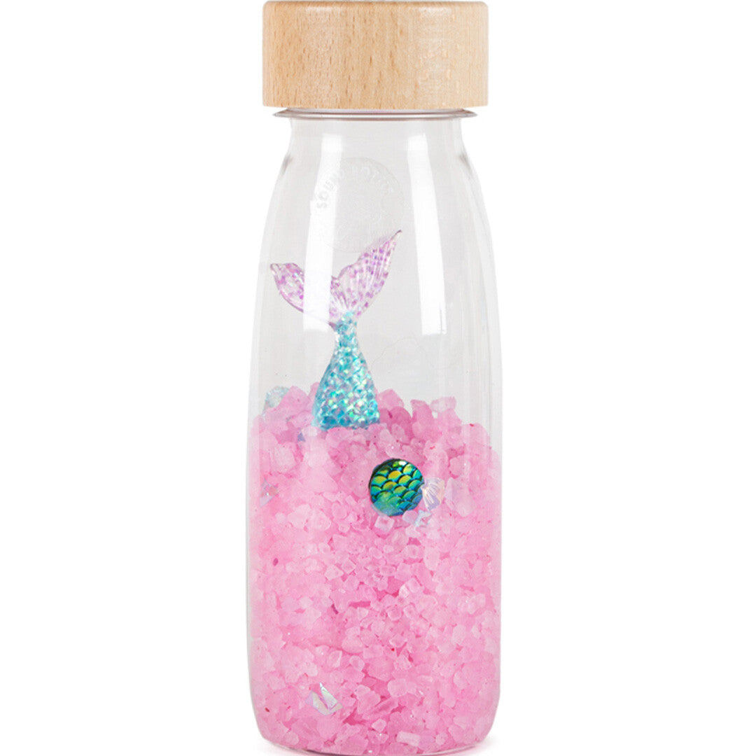 Petit Boum sensorische fles met een zeemeerminstaartje en roze glitters.