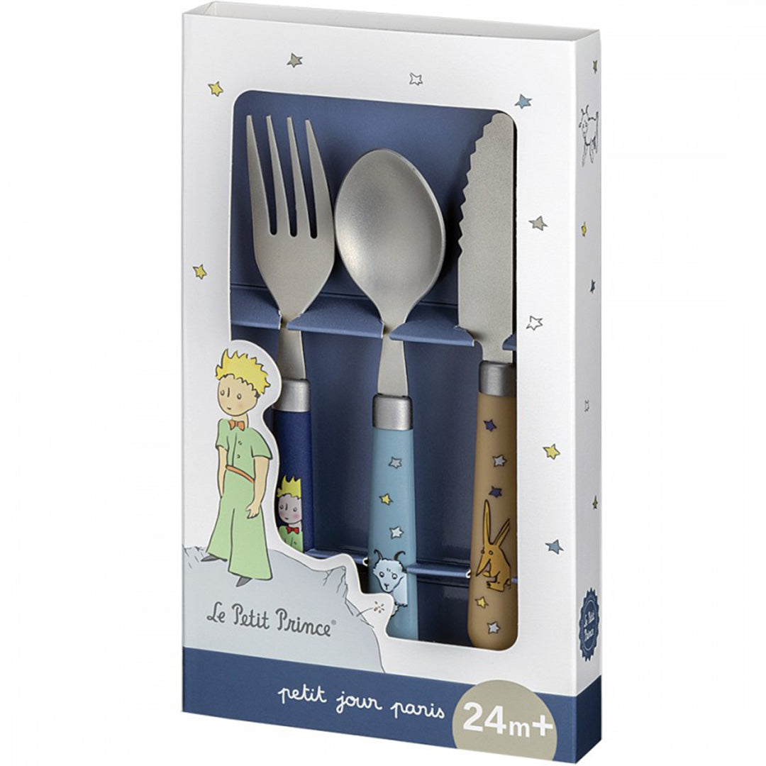 Verpakking van de petit jour kinderbestekset met lepel, vork en mes, versierd met figuren uit De Kleine Prins.
