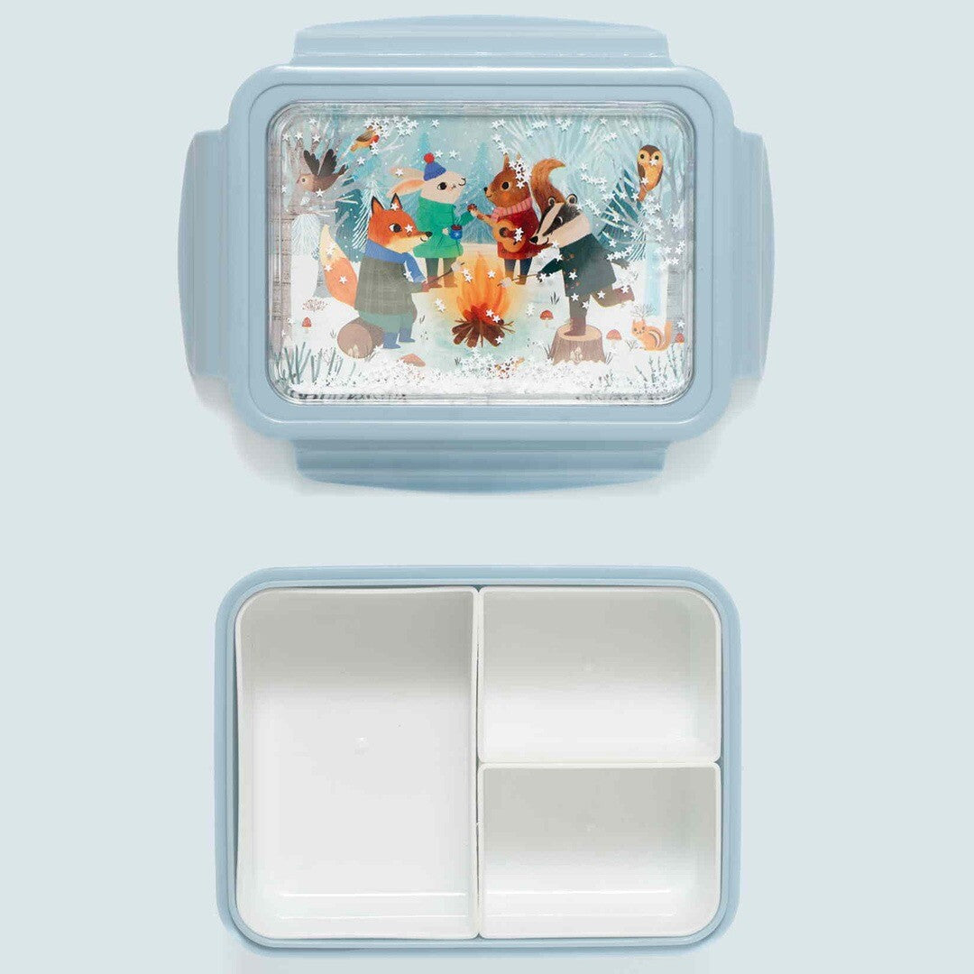 Petit Monkey blauwe bento broodtrommel voor kinderen, van bovenaf gezien, met open deksel en drie compartimenten, en een bonfire animals illustratie op het deksel.
