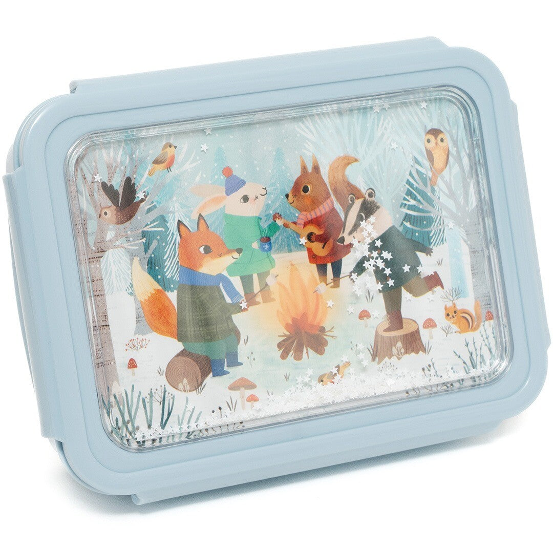 Detail van de Petit Monkey blauwe bento broodtrommel voor kinderen met een close-up van het deksel met bonfire animals illustratie en glitter.