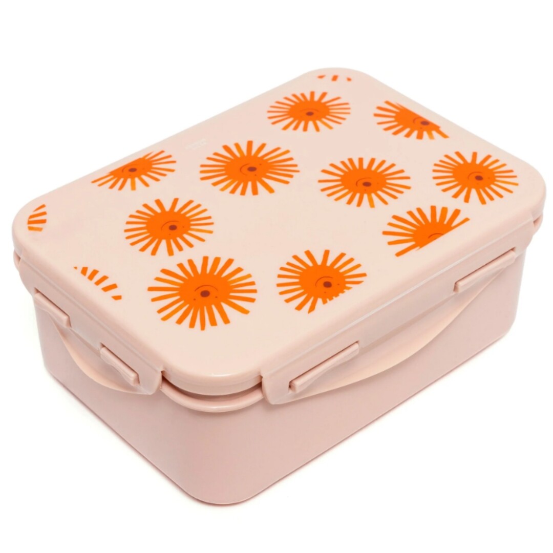 Roze petit monkey broodtrommel voor kinderen met oranje zonnenpatroon.