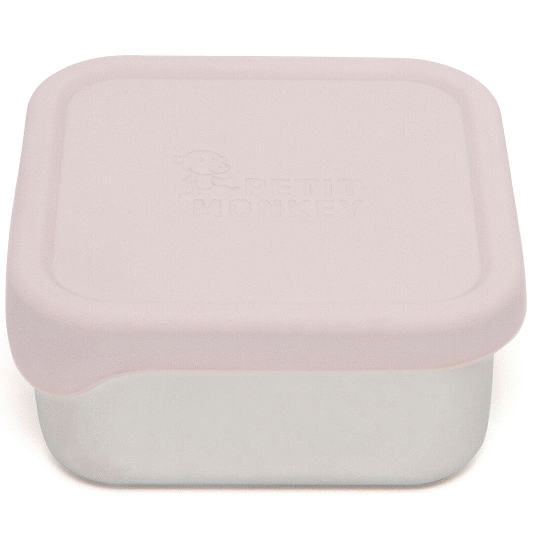 Petit Monkey rvs snackdoosje met roze siliconen deksel en logo.