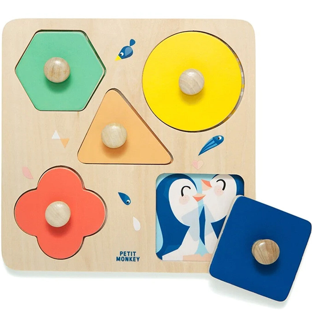 De Petit Monkey houten vormenpuzzel 'One day at the Zoo' met kleurrijke dierengezichten en geometrische vormen, waarbij één puzzelstuk is verwijderd.