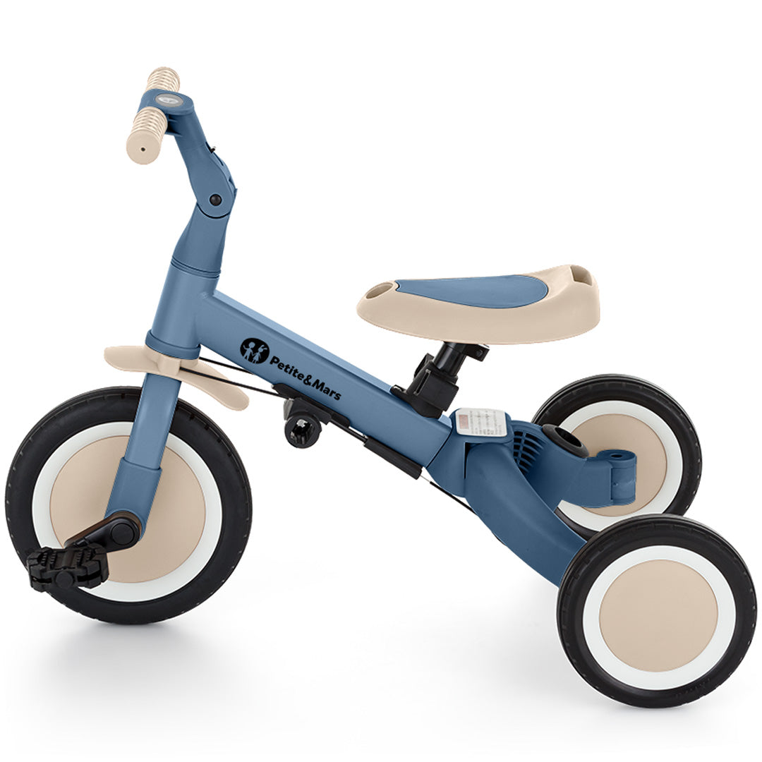 Petite&Mars 5-in-1 kinderfiets als driewieler met pedalen, in blauw en beige.