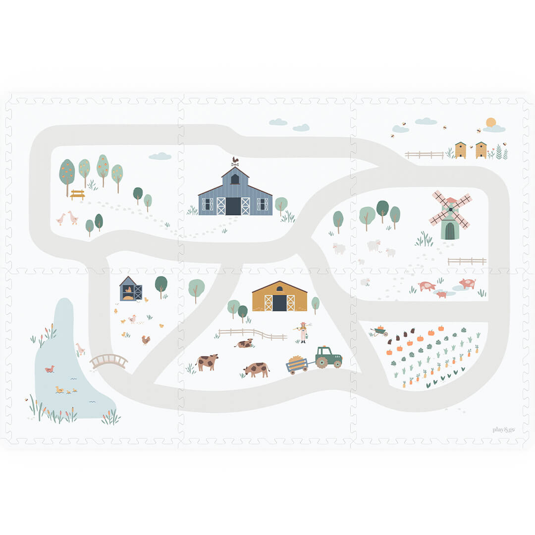 play&go foam speelmat met een boerderijthema, gezien van bovenaf.