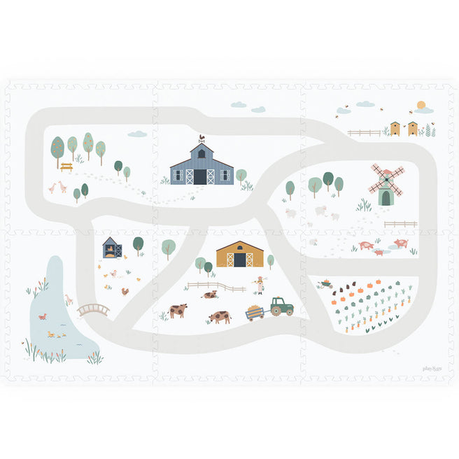 play&go foam speelmat met een boerderijthema, gezien van bovenaf.