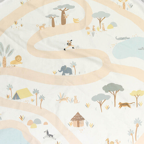 Detail van het play&go speelkleed met jungleprint van dieren en bomen.