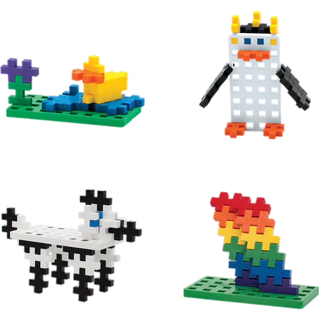 Vier voorbeelden van Plus-Plus Big figuren: een eend, een pinguïn, een zebra en een regenboog.