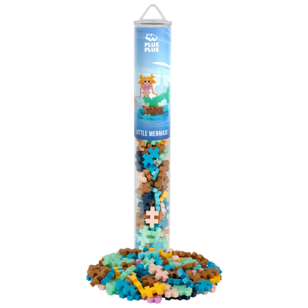 Plus-Plus bouwblokken zeemeermin set met de verpakkingstube en een hoop losse bouwblokken.