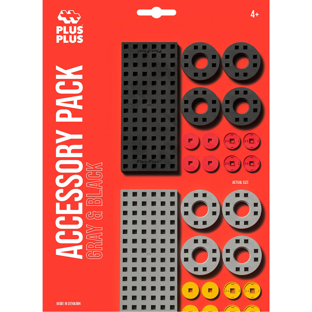 Plus-Plus accessoirepakket bouwstenen in grijs en zwart op de voorkant van de verpakking.