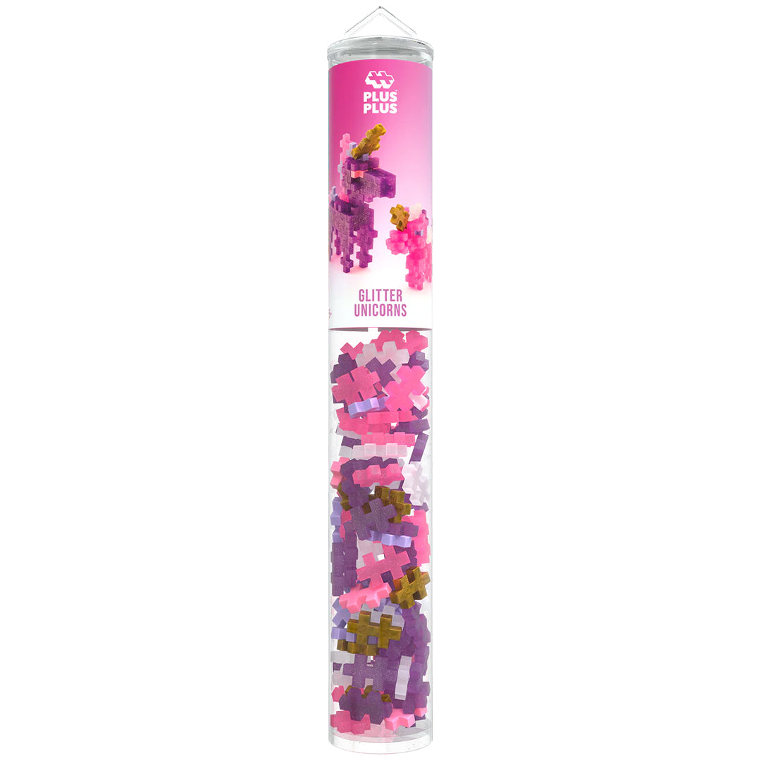 Verpakking van Plus-Plus bouwstenen glitter eenhoorns in een transparante koker.