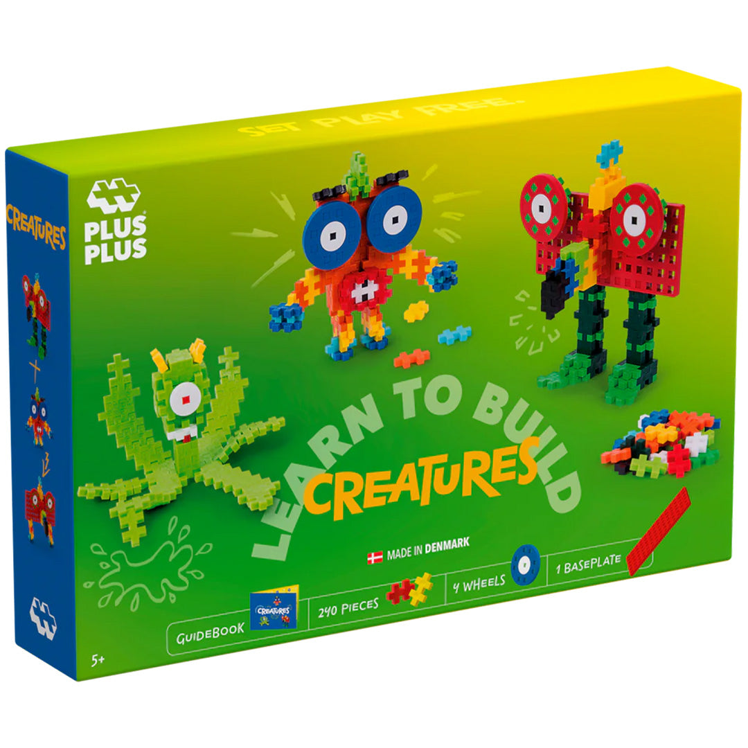 Verpakking van de Plus-Plus Learn to Build Creatures bouwset met kleurrijke monsterfiguren.