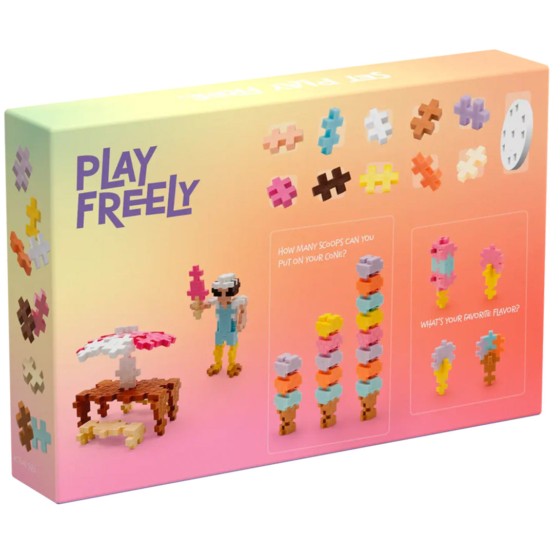 Achterkant van de Plus-Plus bouwblokken 'Learn to Build Ice Cream Shop' verpakking met diverse bouwvoorbeelden.