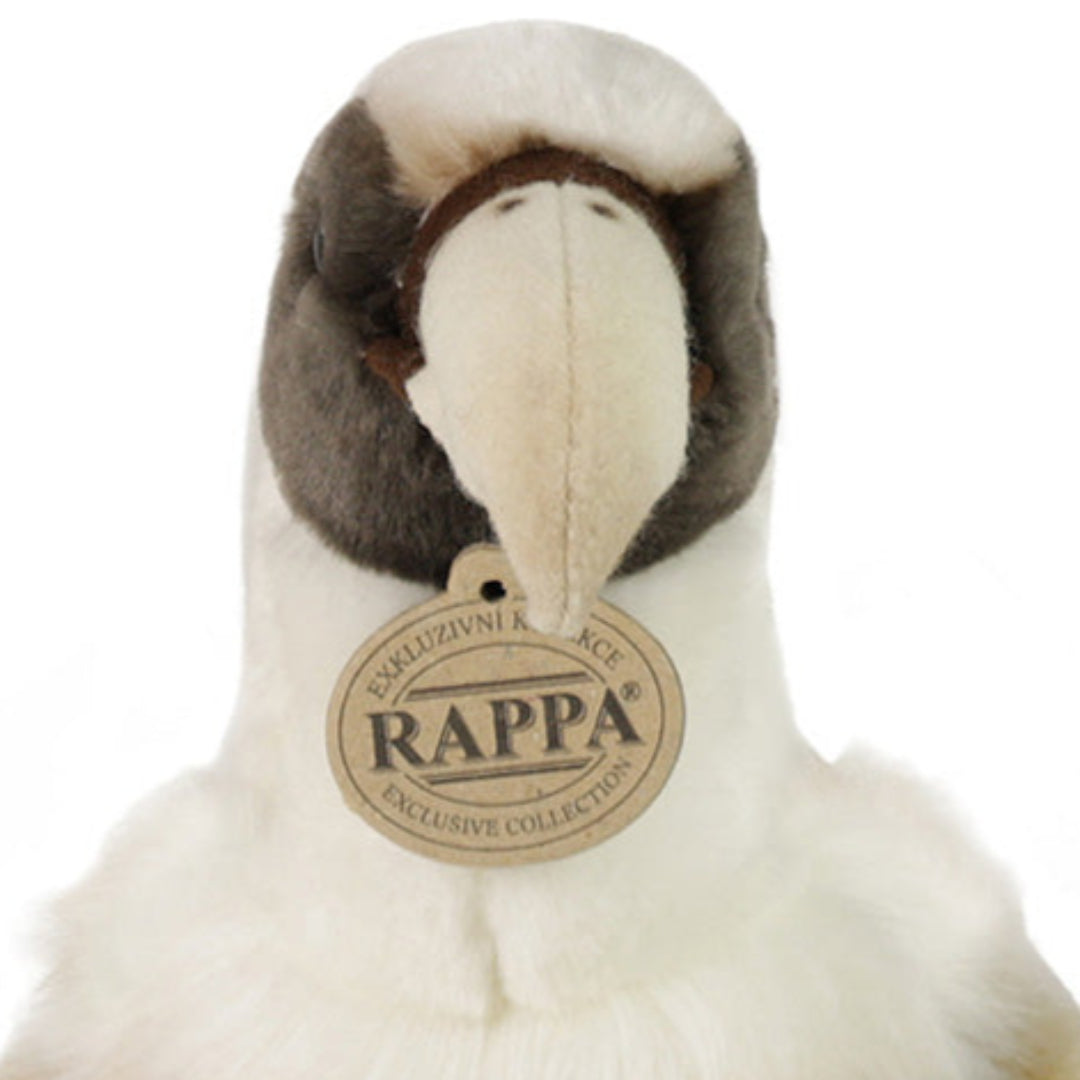 Detailfoto van de kop van de Rappa pluchen gier knuffel met het merklabel.