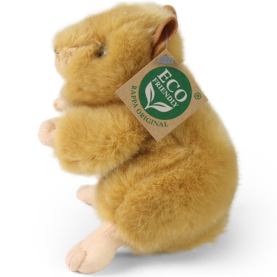 Rappa pluchen hamster in goudkleur, van de zijkant gefotografeerd met een label.