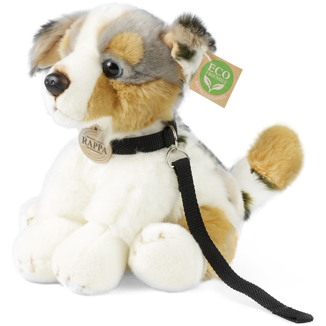 Rappa pluchen Australian Shepherd hond met halsband en riem, schuin van voren gezien.