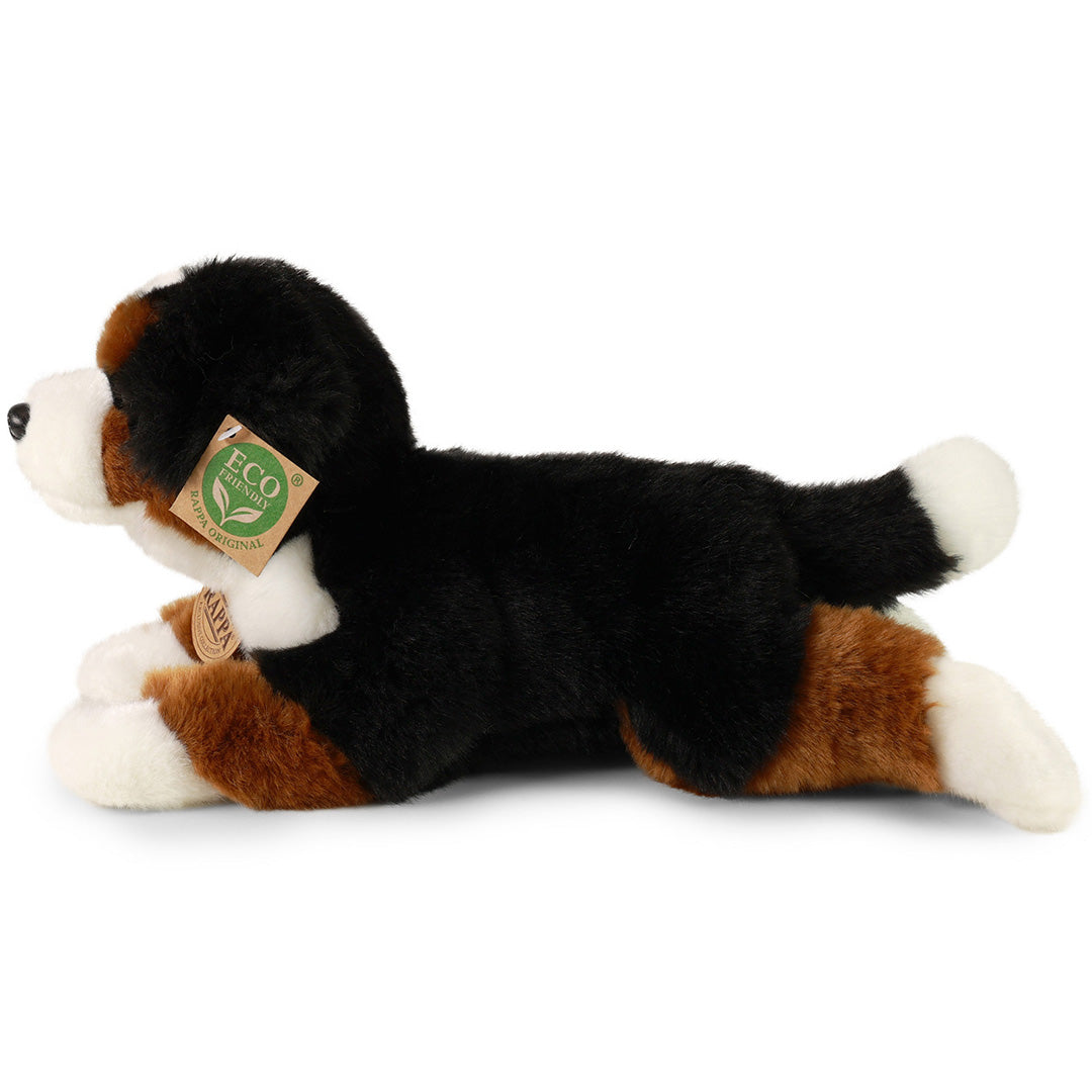 Rappa pluchen Berner Sennen hond liggend, van de zijkant gezien.