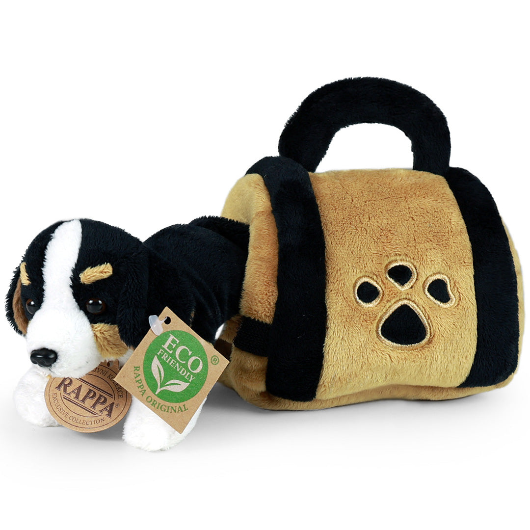 Rappa knuffelhond in de vorm van een Berner Sennen die uit een bijpassende pluchen draagtas met pootafdruk komt.